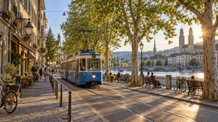Blue Tram beside a Riverside Park jigsaw puzzle