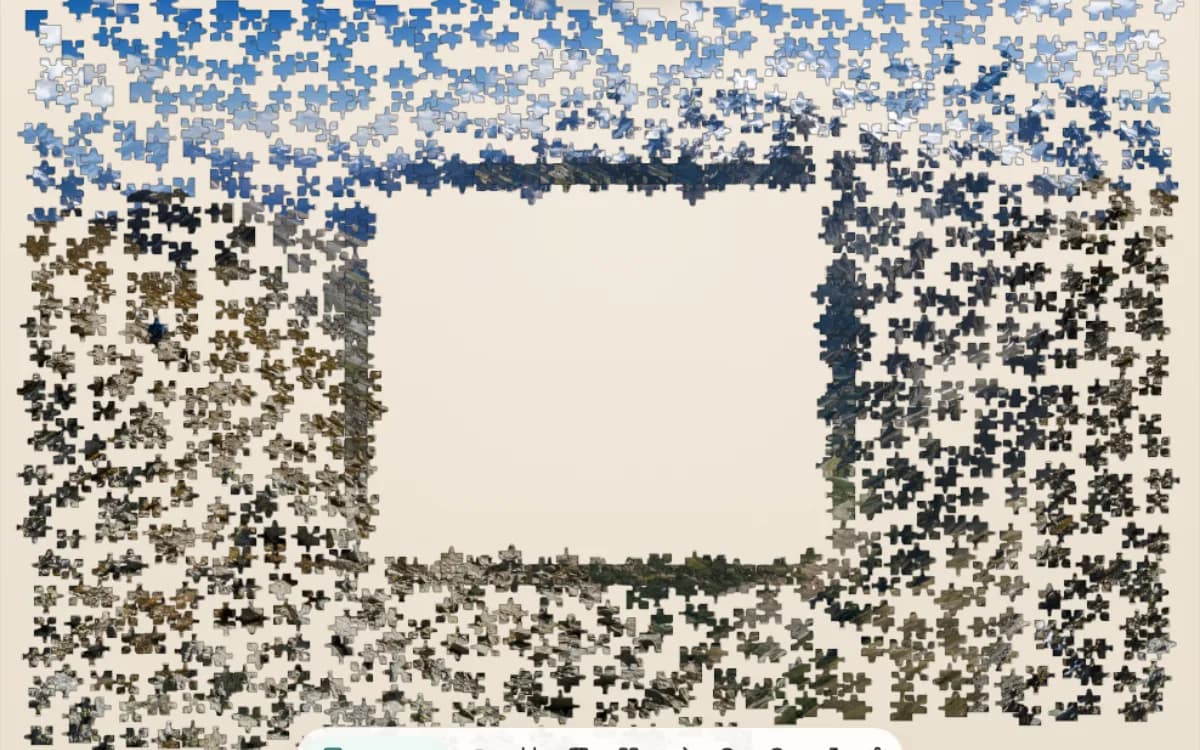 The Mountain Challenge puzzle at 1000 pieces on Jigsaway, rock and snow ridge pieces spread around an open assembly area.