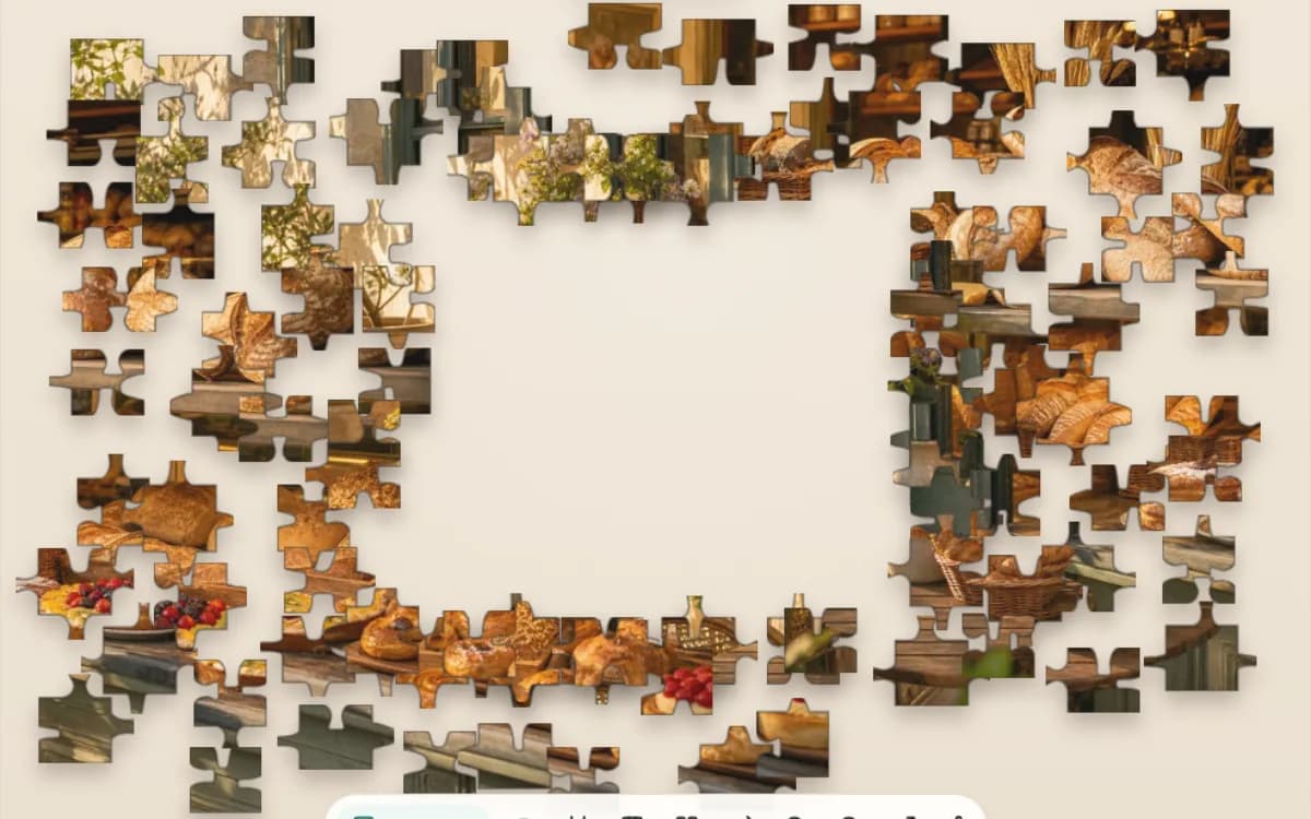 The Village Bakery puzzle open at 24 pieces on Jigsaway, warm bakery colors broken into chunky pieces with a clear center.