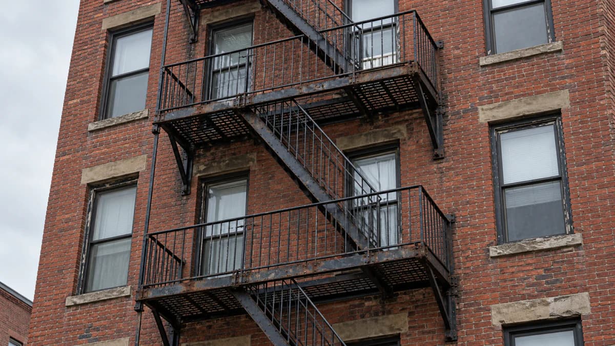 Iron Fire Escapes on a Brick Apartment Block jigsaw puzzle preview