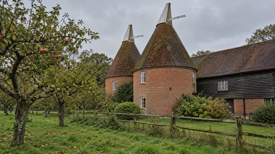 Oast Houses with White Cowls beside an Orchard jigsaw puzzle